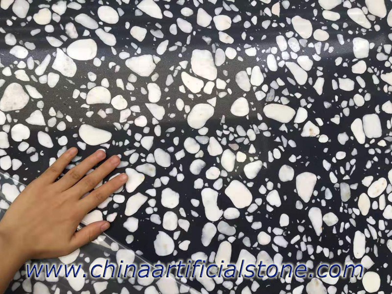 Black Terrazzo slabs with large white cobble aggregate 